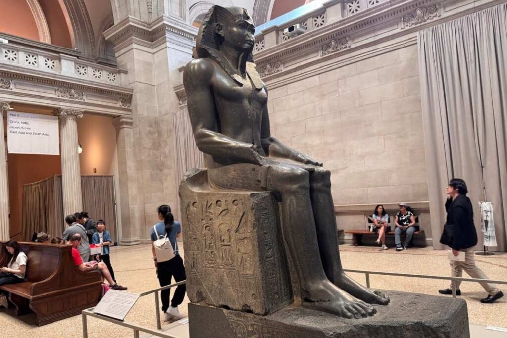 The tour begins in the main lobby of the Metropolitan Museum, right by the large seated pharaoh statue - original photo
